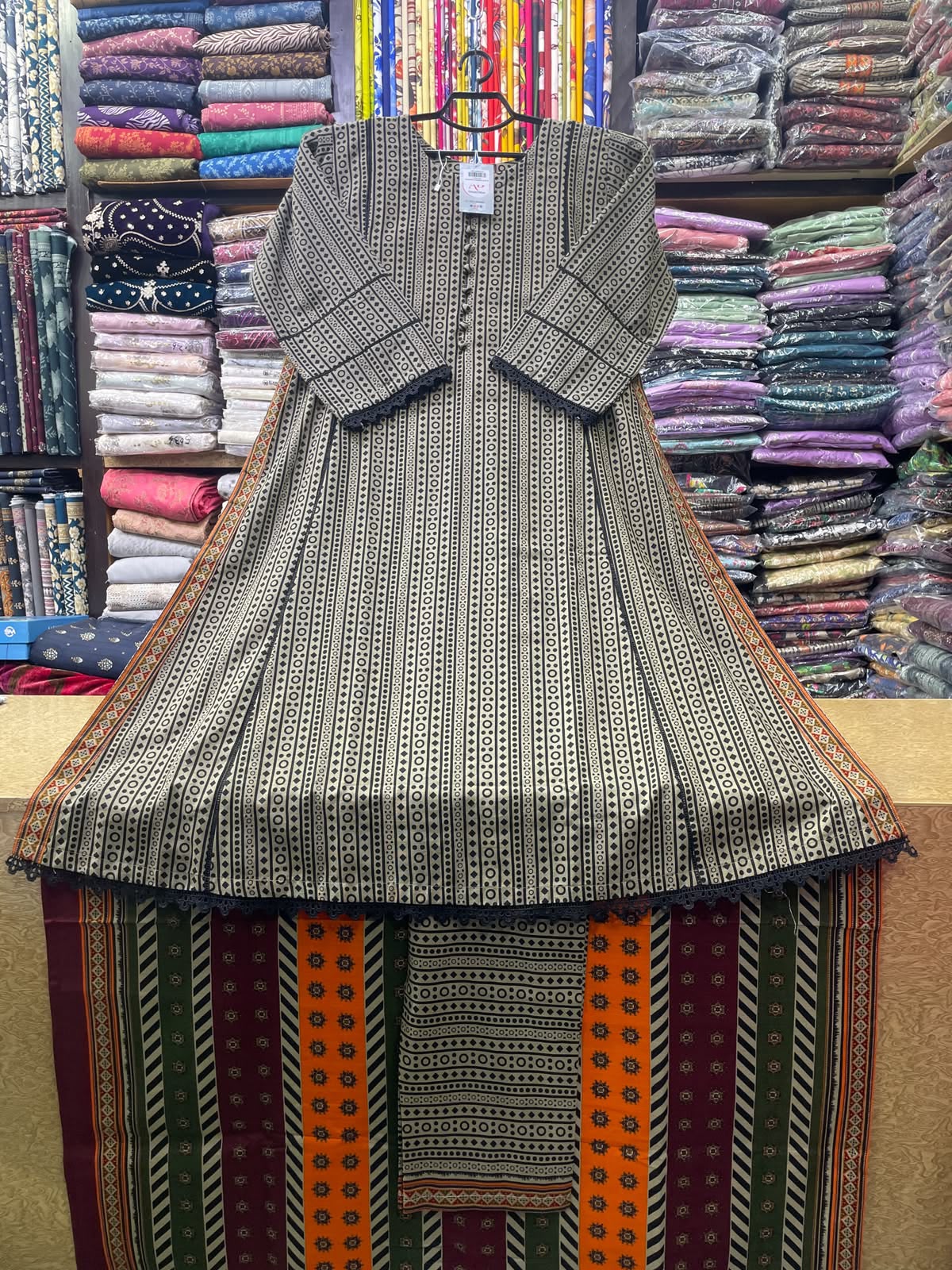 Bin Saeed 3-Piece Stitched Khaddar Suit | Beige & Black Geometric Printed A-Line Set