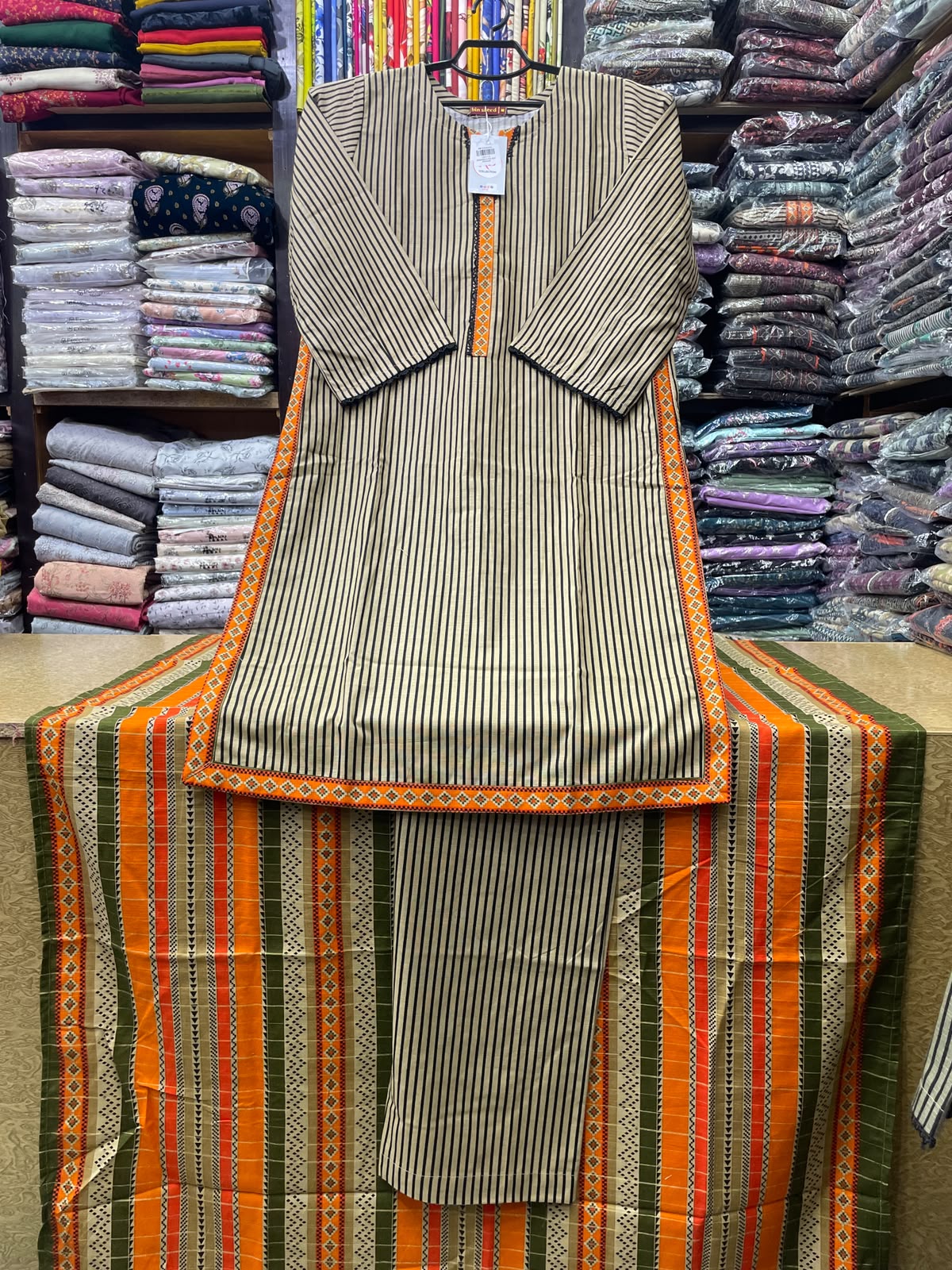 BinSaeed Winter Collection – Stitched 3 Pc Pinstriped Khaddar Suit with Orange Geometric Trims
