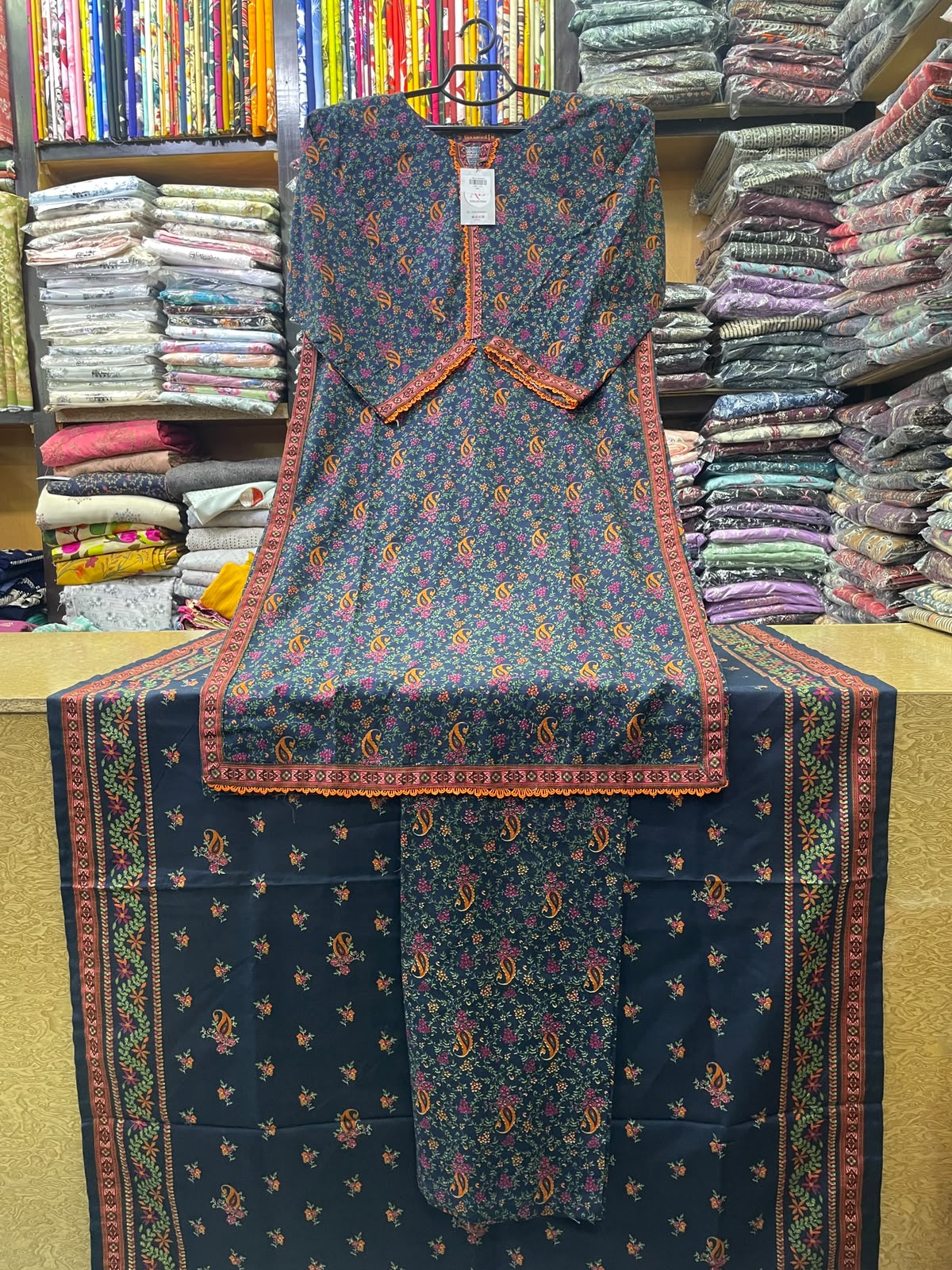 Bin Saeed Printed Khaddar 3-Piece Suit with Printed Khaddar Shawl – Dark Teal & Orange Paisley Design