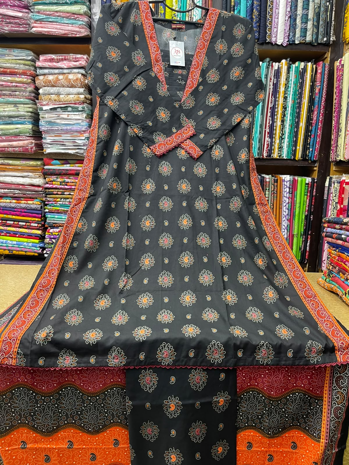 Premium 3-Piece Stitched Lawn Suit Black Chunri Print A-Line Kurti with Rust-Orange Dupatta