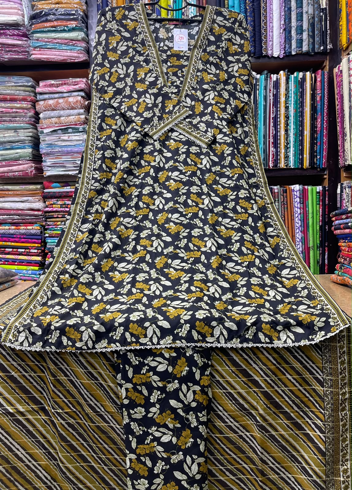 Premium 3-Piece Stitched Lawn Suit  Black Foliage Print A-Line Kurti with Olive & Mustard Diagonal Striped Dupatta