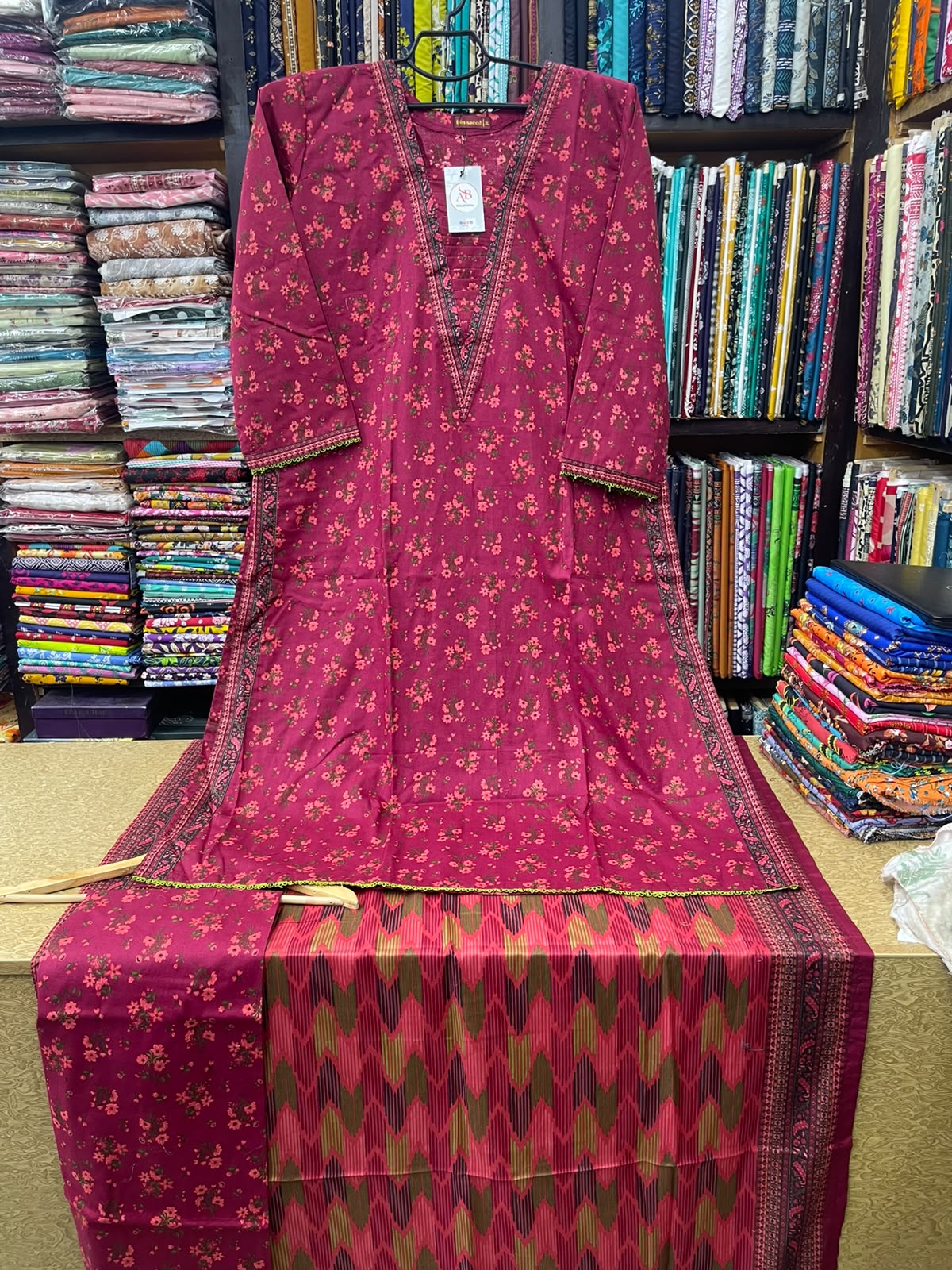 Premium 3-Piece Stitched Lawn Suit – Plum Magenta Floral A-Line Kurti with Ikat Geometric Dupatta