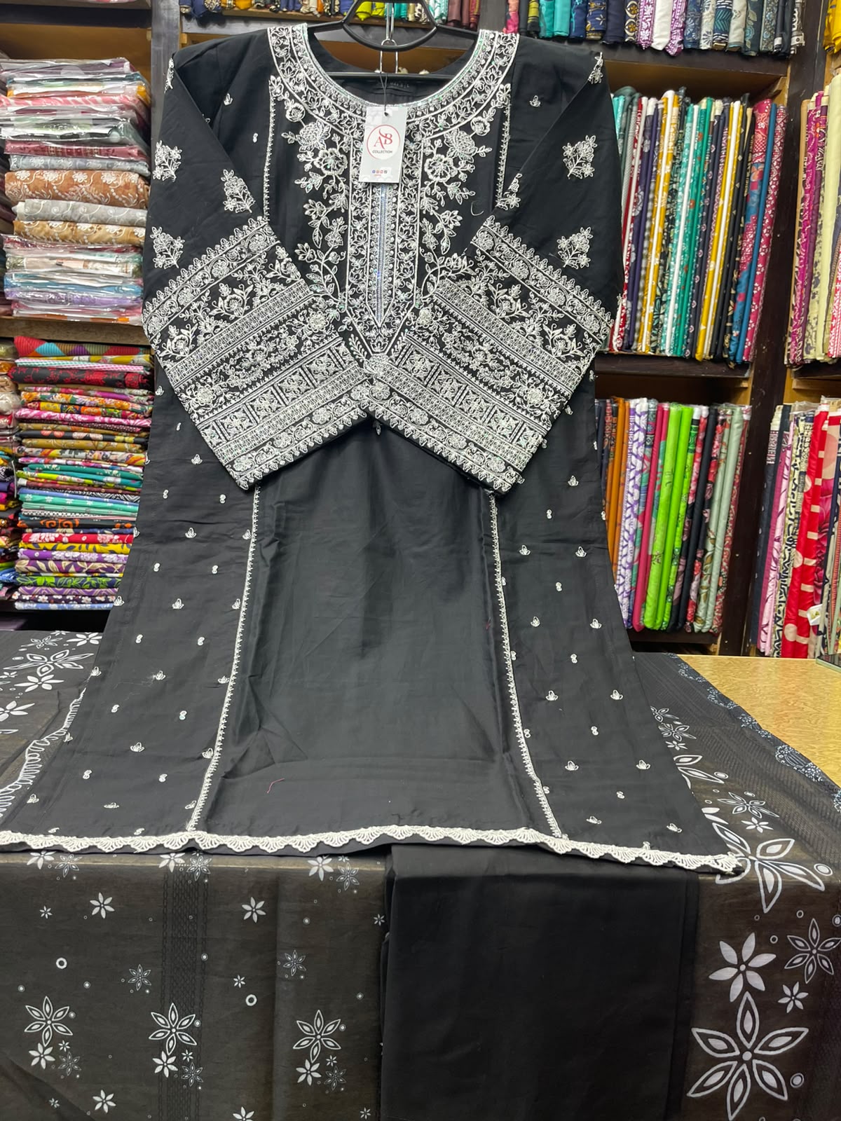 Premium Stitched 3-Piece Black Lawn Suit with Heavy White Embroidery
