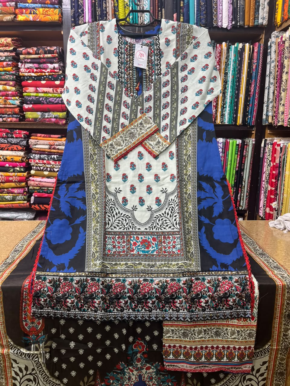 Graceful Off-White & Royal Blue 3-Piece Printed Lawn Suit with Farshi Shalwar