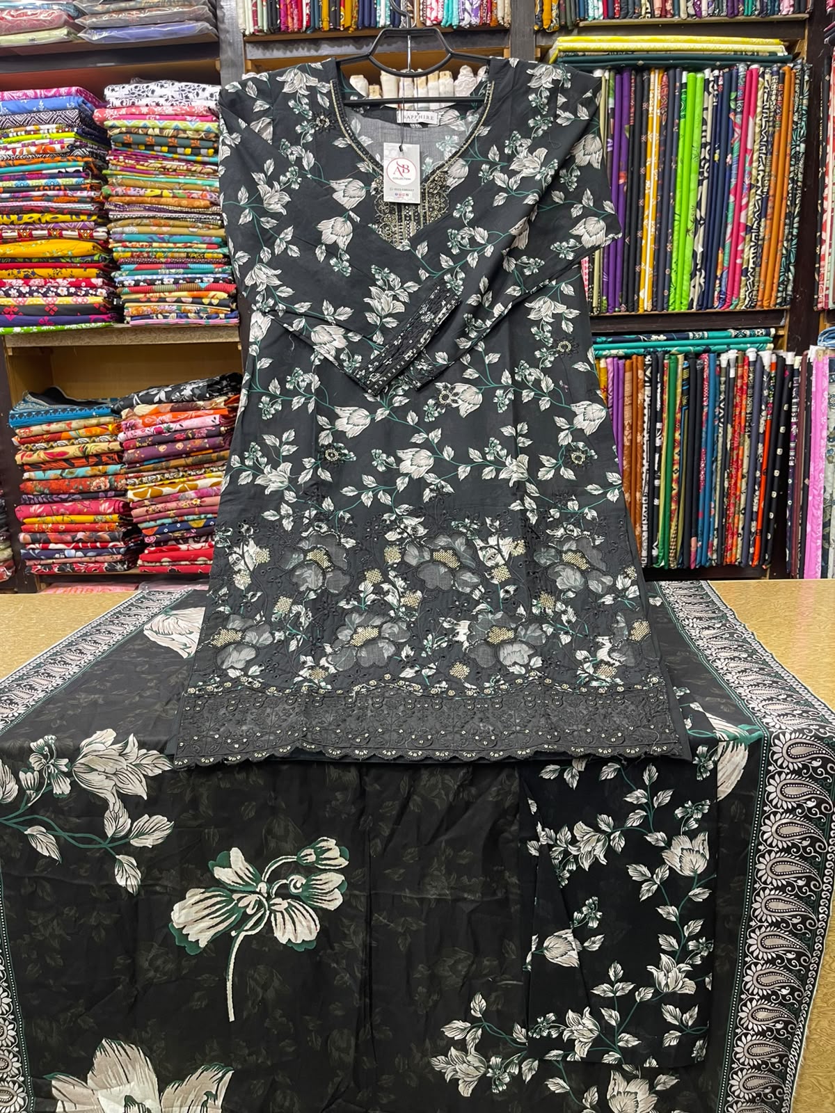 Elegant Charcoal Black Kameez with Cutwork Daman, Matching Printed Trouser & Dupatta