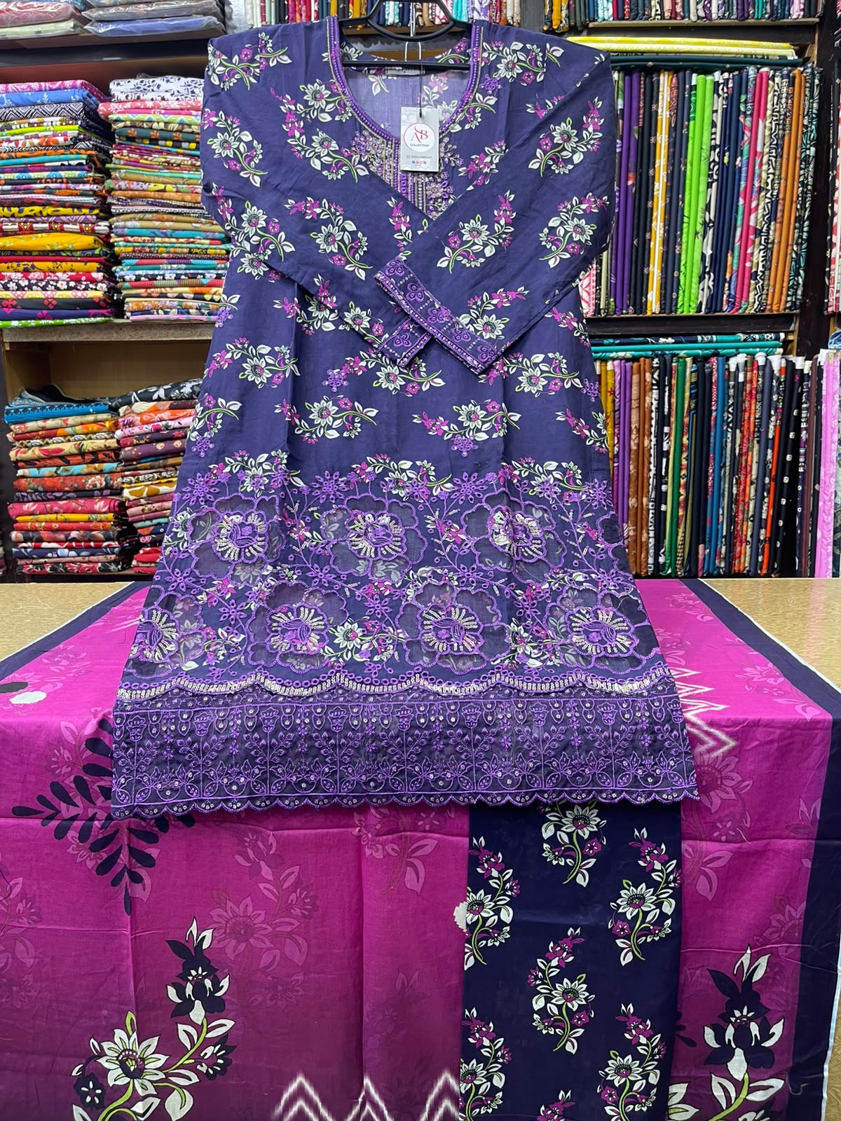 Elegant Indigo Kameez with Cutwork Daman, Matching Printed Trouser & Magenta Dupatta
