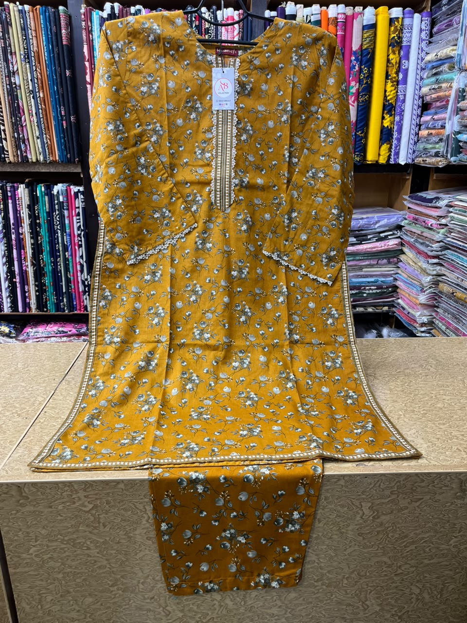 Warm Ochre Mustard 2-Piece Printed Lawn Suit  Lace Trimmed Neckline & Border Detail