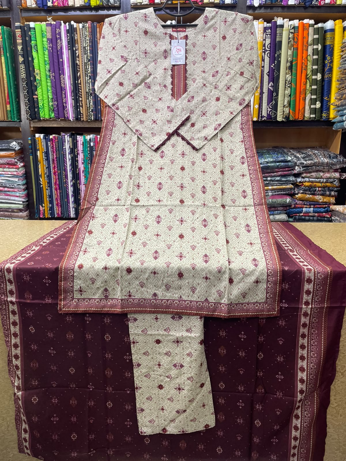 Off-White & Maroon Geometric Printed Lawn 3-Piece Suit Soft Printed Lawn Dupatta