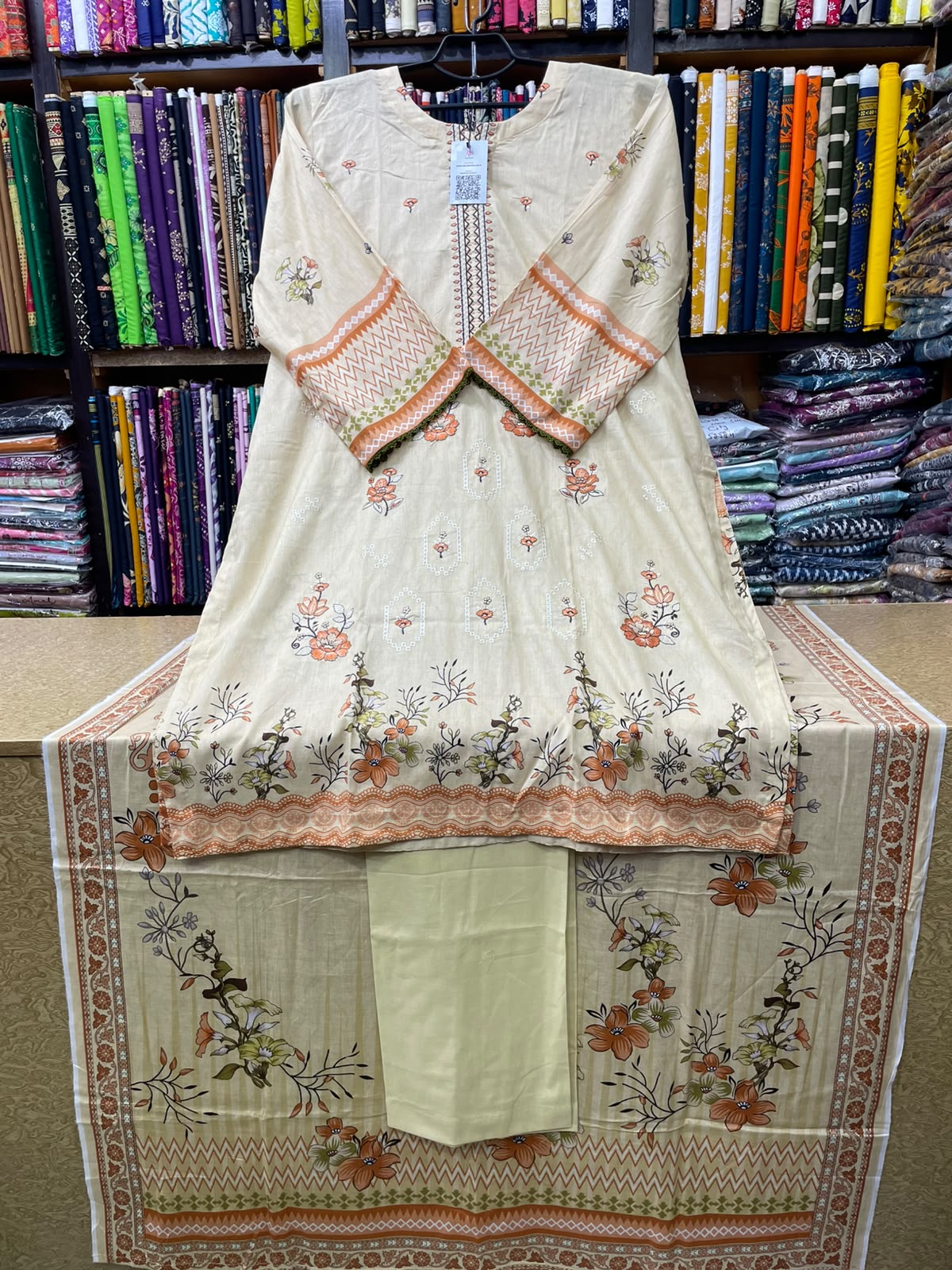 3 Piece Embroidered Lawn Suit with 4-Side Lace Dupatta & Loose Flapper Trouser Off-White & Peach Floral