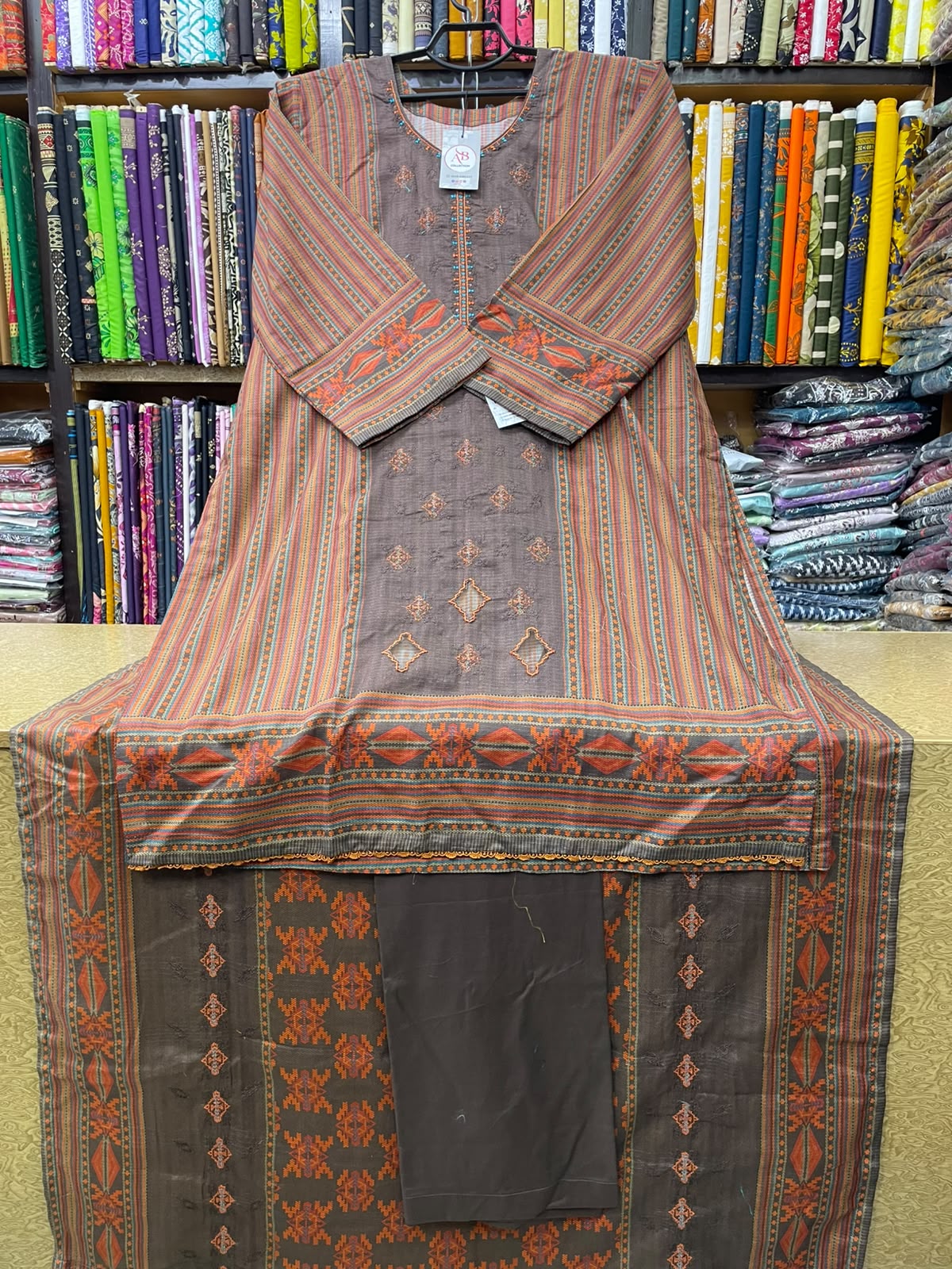 3 Piece Embroidered Lawn Suit with Printed Dupatta & Plain Trouser  Earthy Brown & Rust Ethnic Print