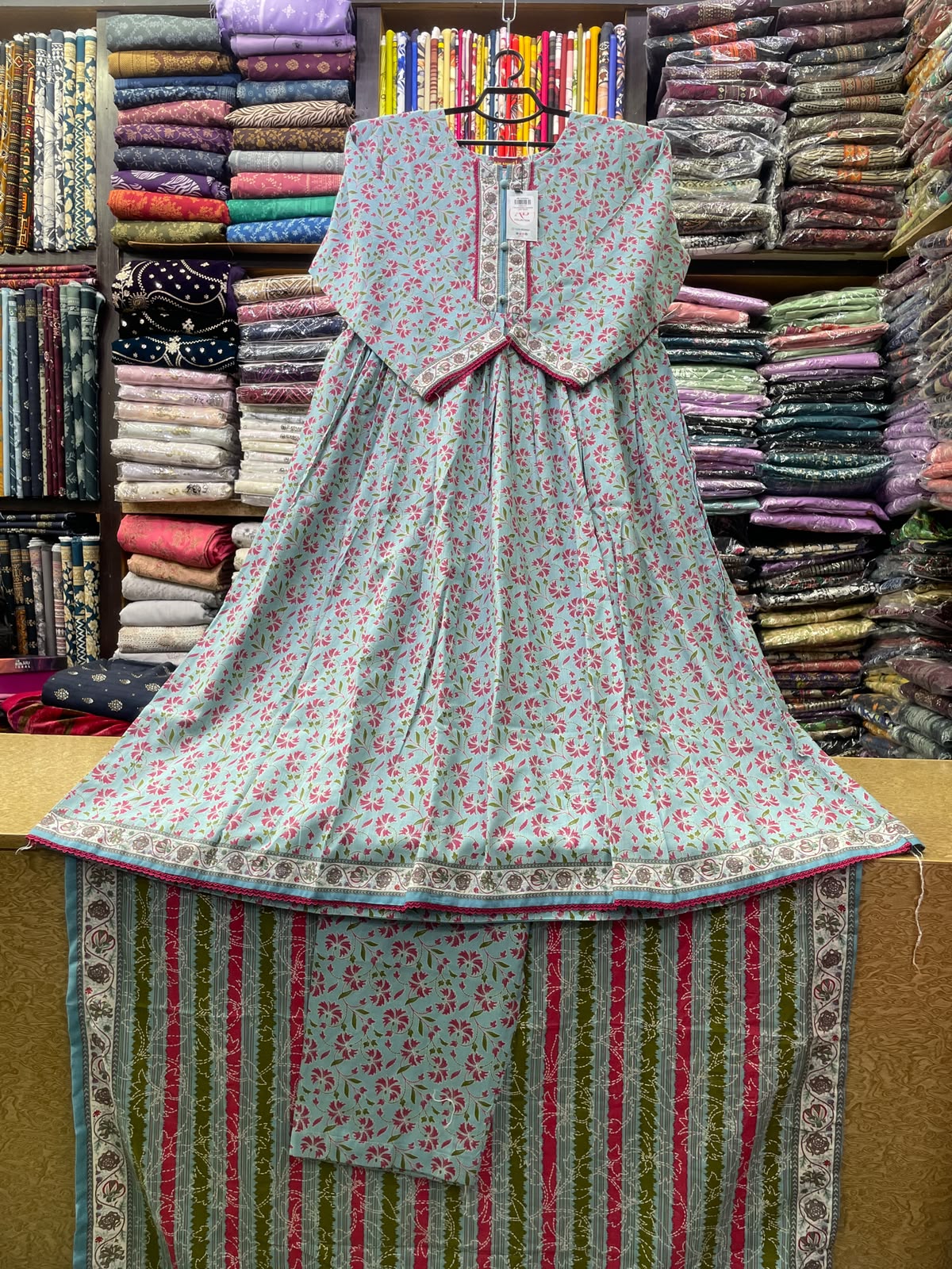 Bin Saeed Light Blue Floral Printed Khaddar 50-Inch Long Frock Style Suit with Khaddar Shawl and Same Printed Trouser