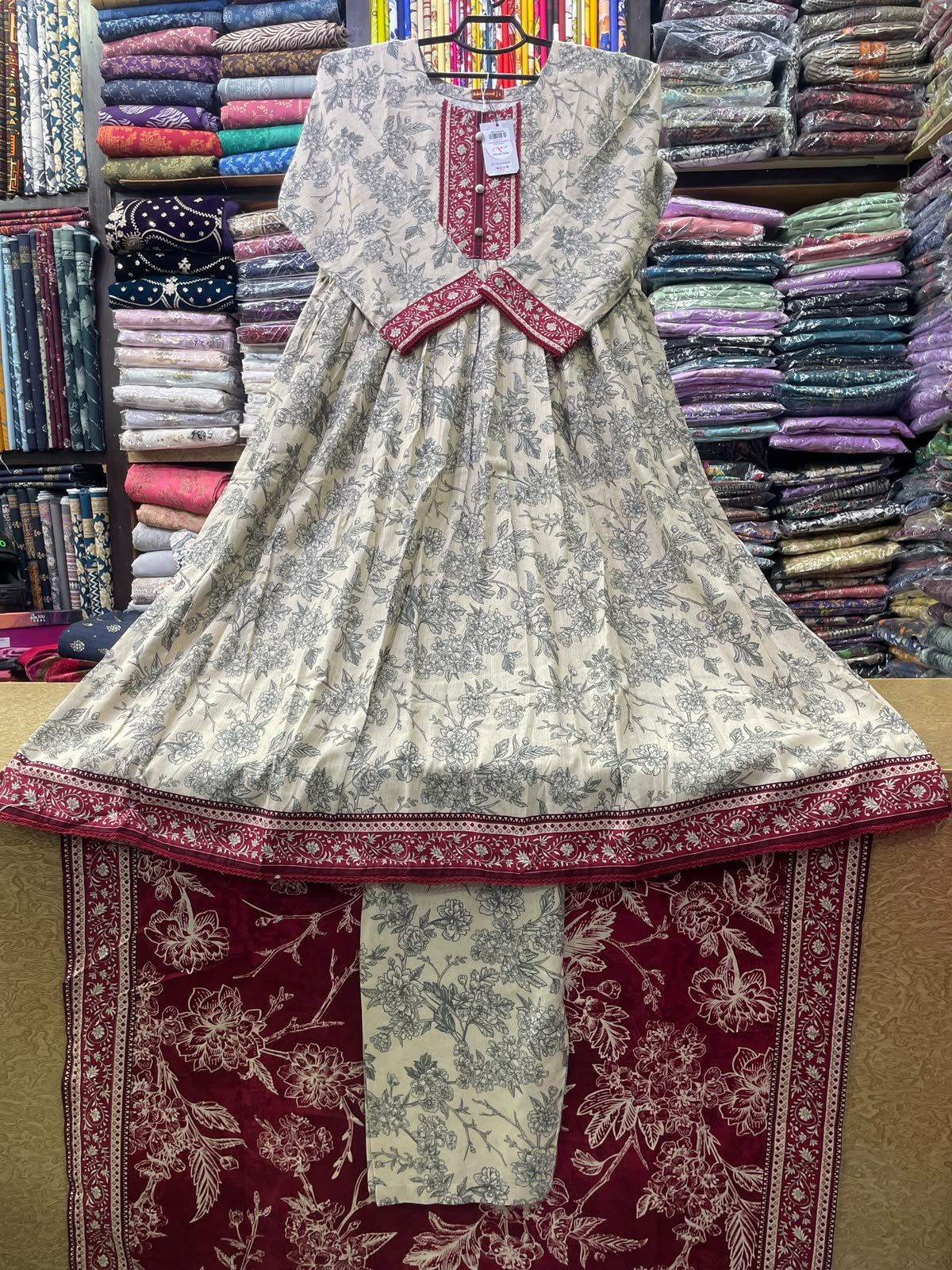 Bin Saeed Winter Printed Khaddar 3-Piece Floral Frock Style Suit with Maroon Accents and Matching Shawl