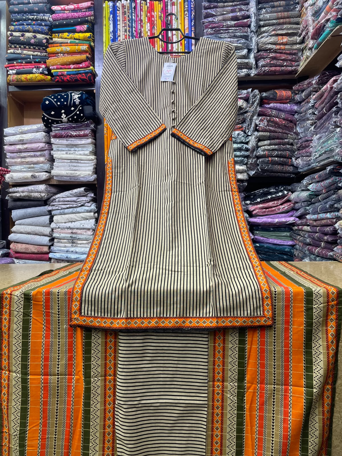 Bin Saeed Striped Pocket Style Long Length 3-Piece Printed Suit (50" Shirt Length) with Orange & Olive Patterned Dupatta