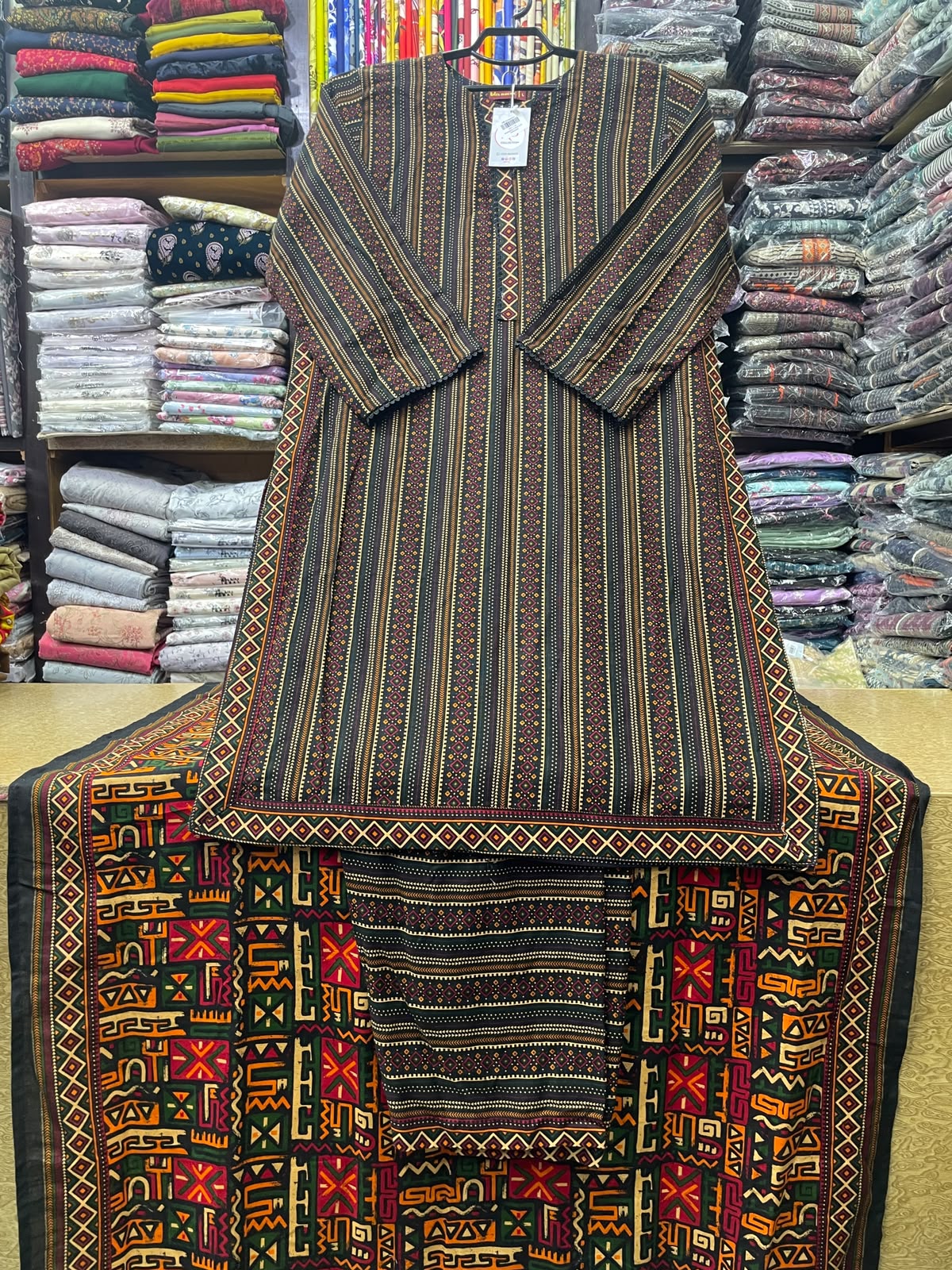 BinSaeed Ready to Wear Stitched Khaddar 3 Piece Suit – Dark Multi-Striped Kurta, Trouser & Cultural Printed Dupatta