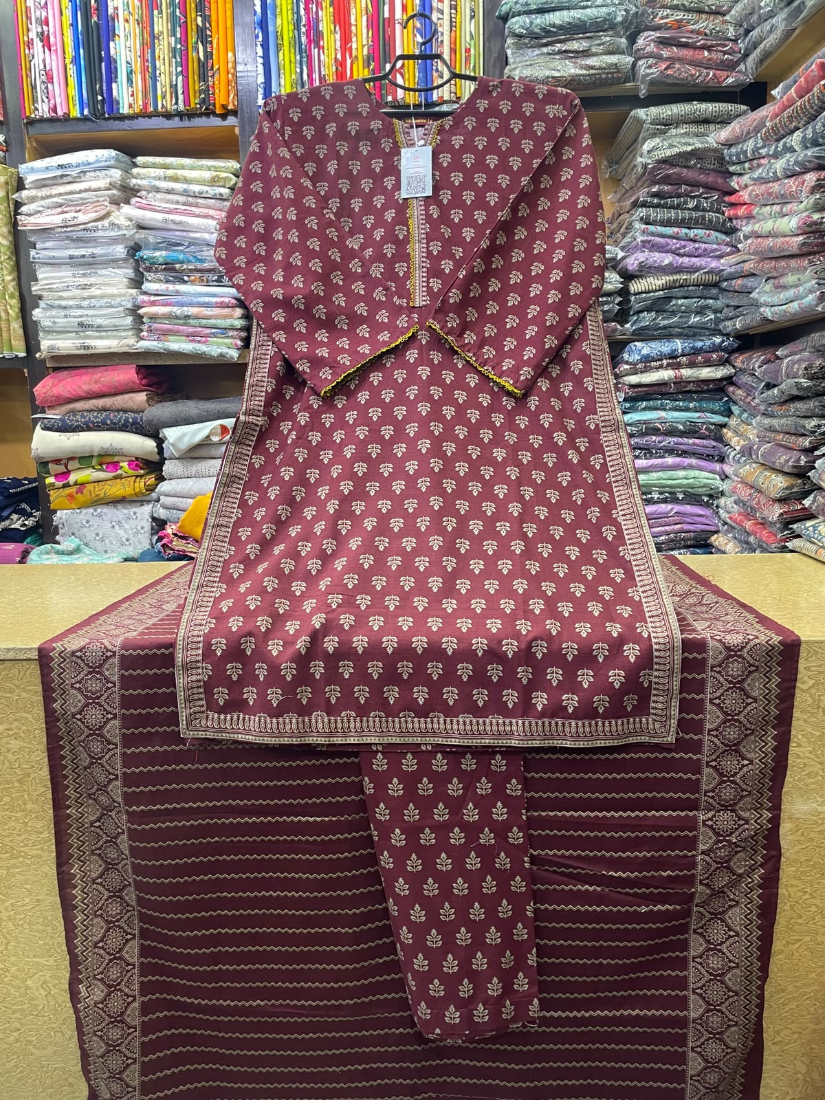 Bin Saeed Printed Khaddar 3-Piece Suit with Printed Shawl – Deep Maroon & Cream Ethnic Motif Design